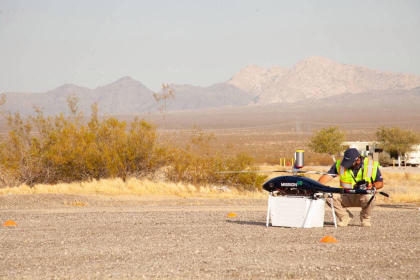 Drone and operator in the desert